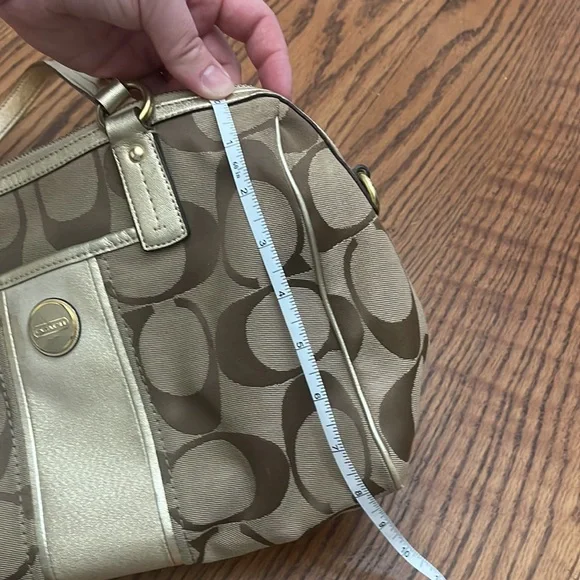 Gold coach purse